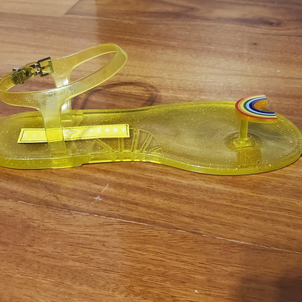 Yellow Katy Perry sandals with rainbow thong